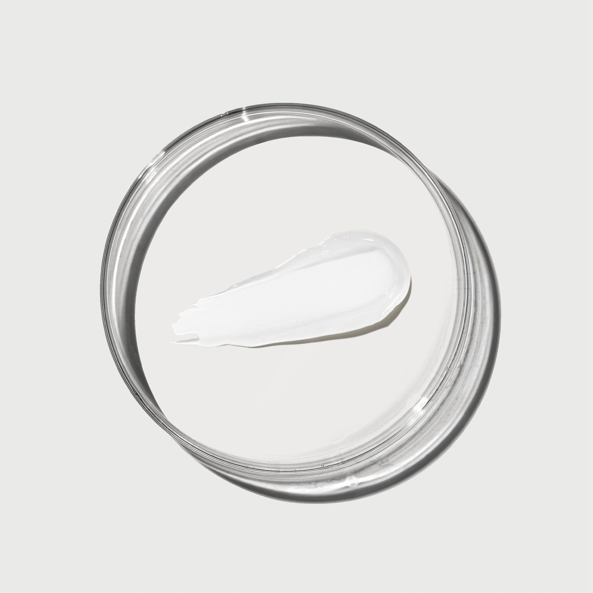 NATR-10124_Swatch_PhytoGlow_SPF_Clear_petri_bonebkgd_1